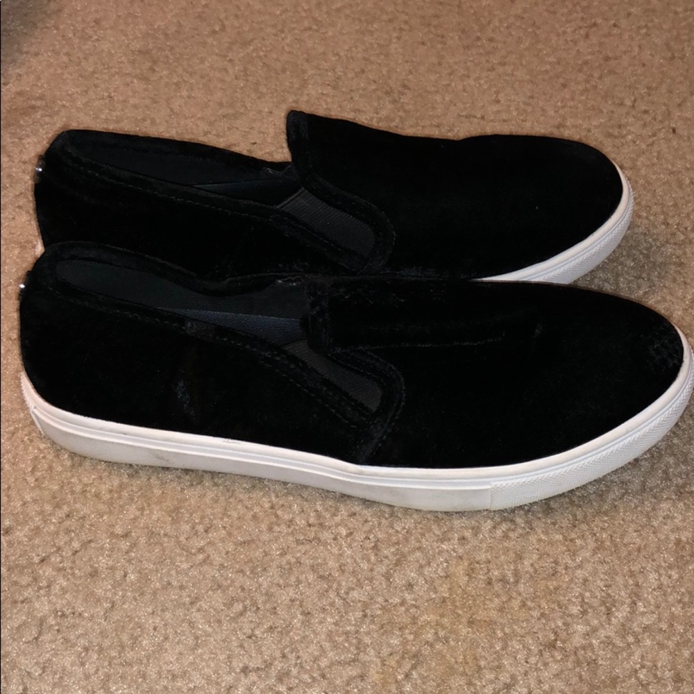 Black velour slip ons